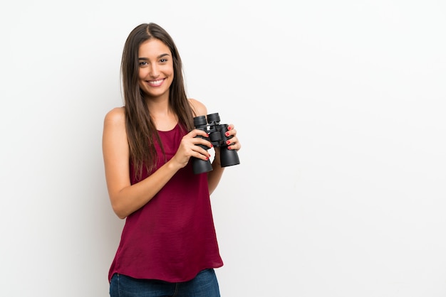 Young womanwith black binoculars