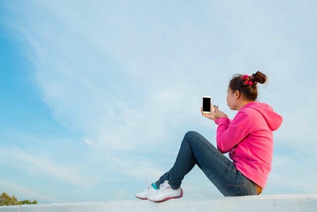 Young women are beautiful selfie sky at sunset