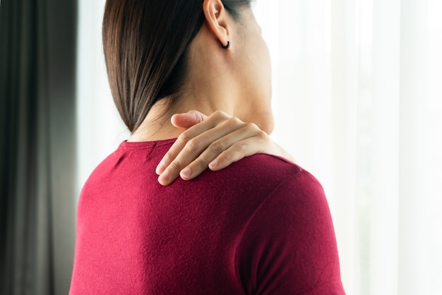 Young women neck and shoulder pain injury, healthcare and medical concept