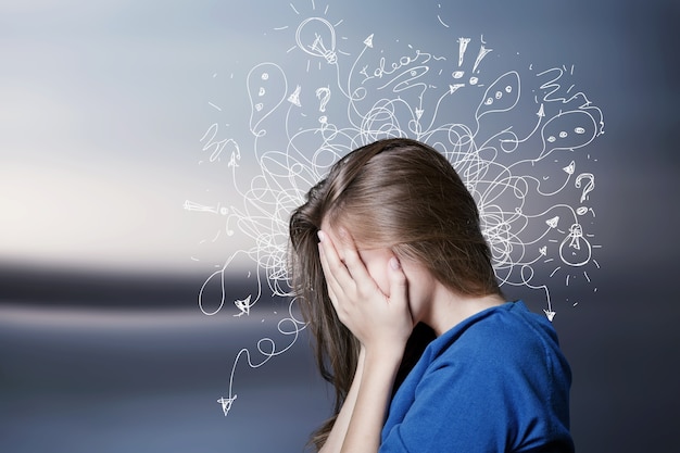 Young worried stressed face expression with long hair