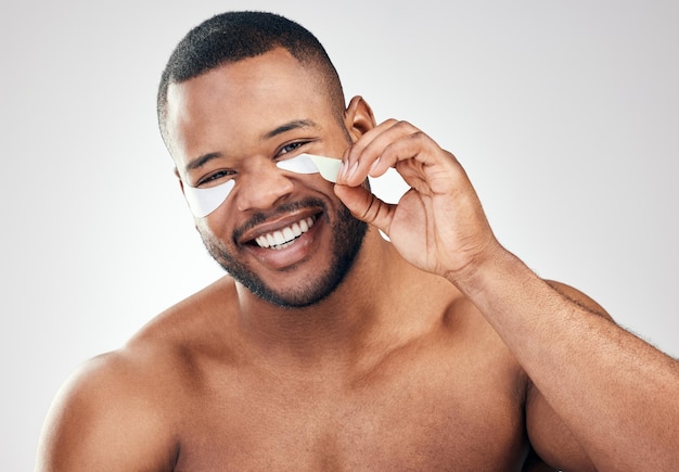 Your appearance affects the way you regard yourself Studio portrait of a handsome young man wearing undereye patches against a white background