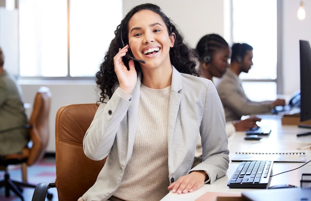 Your best service will never let you down. Shot of a beautiful young woman working in a call center.