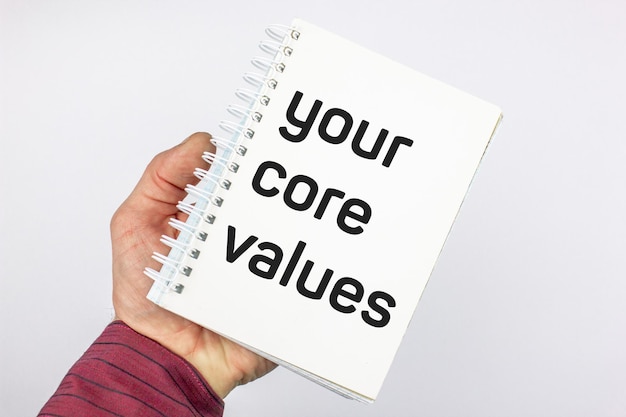 Your core values text on notepad The concept of your values