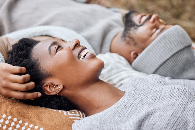 Your point of view is always so enlightening Shot of a young couple lying down together while camping