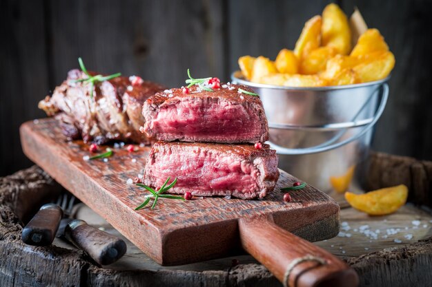 Yummy steak and chips with rosemary and salt