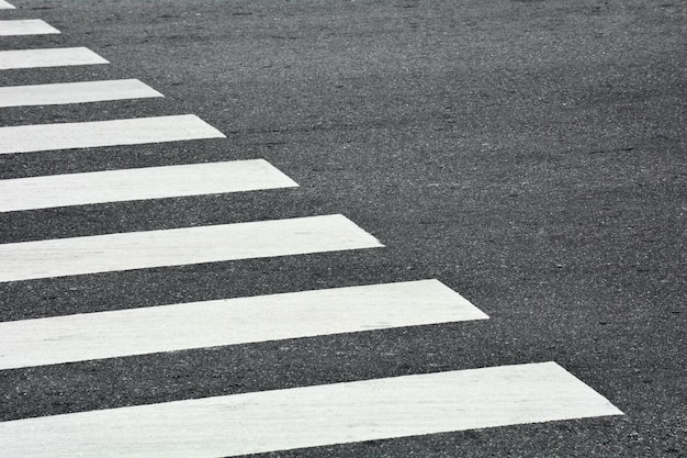 Zebra crosswalk on a asphalt road 