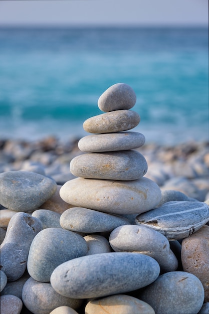 Zen balanced stones stack on beach