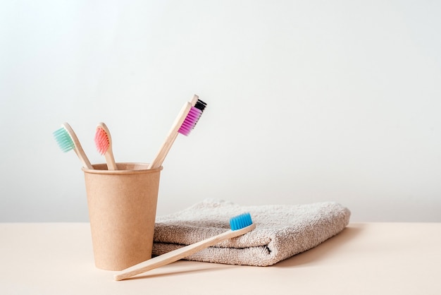 Zero waste bamboo toothbrushes in paper cup dental care with zero waste concept sustainable lifestyle