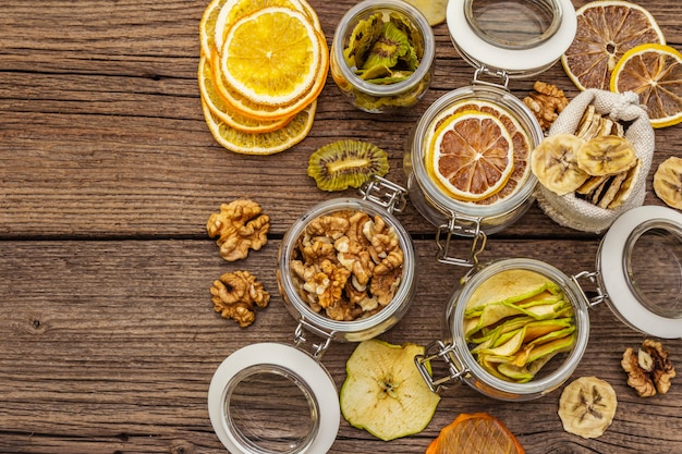 Zero waste food shopping concept. Assortment of dried fruits, walnuts. Sustainable lifestyle