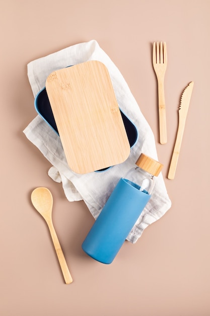 Zero waste kit for lunch, reusable bottle, box and bamboo cutlery. Sustainable lifestyle concept