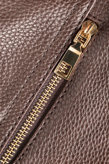 Zipper in leather closeup