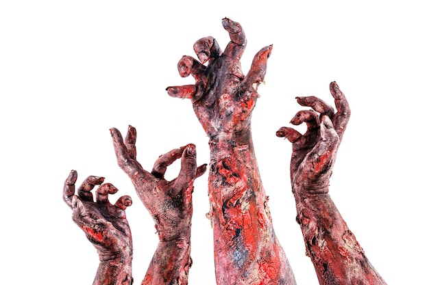 Zombies or monsters hand attacking, attack or nightmare concept, isolated white surface.