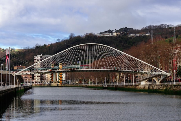 Zubizuri bridge at the daytime in Bilbao, Spain