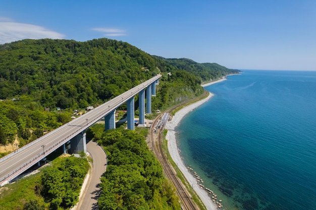 The zubova schel viaduct is a road bridge dzhubga adler federal road aerial view of car driving alo