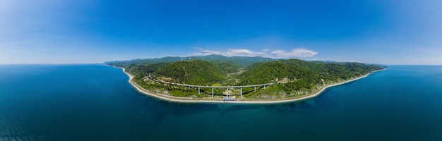 The zubova schel viaduct is a road bridge dzhubga adler federal road aerial view of car driving alon