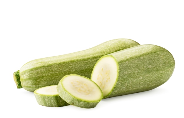 Zucchini and half with sliced slices close-up on a white background