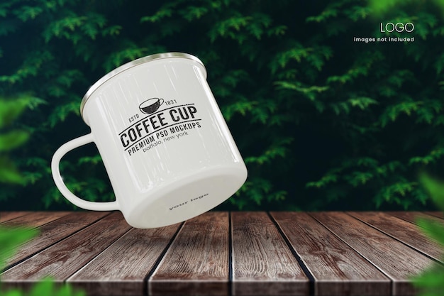 11oz enamel coffee mug mockup on outdoor table with green nature background