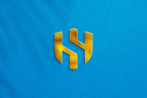 3D Effect Gold Logo Mockup on Blue Texture Background with Shadow