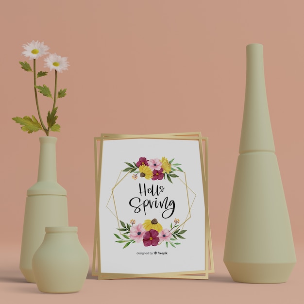 3d ornaments and hello spring card on table