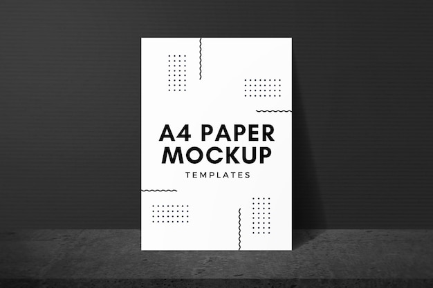 A4 Paper Mockup Leaning on Dark Wall Background