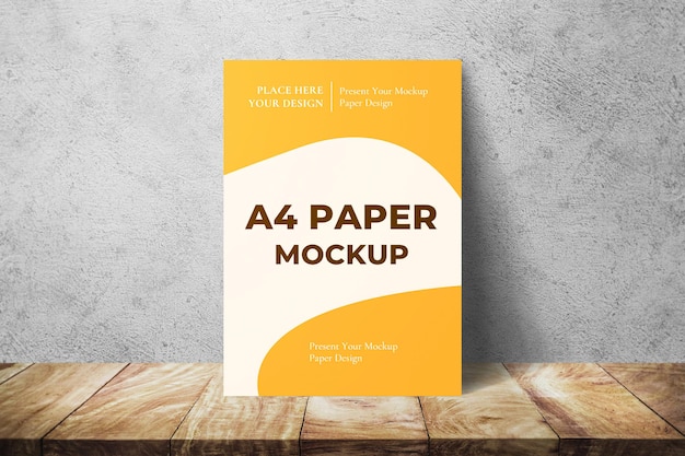 PSD a4 paper mockup wood surface leaning on wall texture