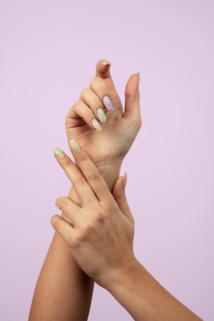 Adult woman hands with nail polish