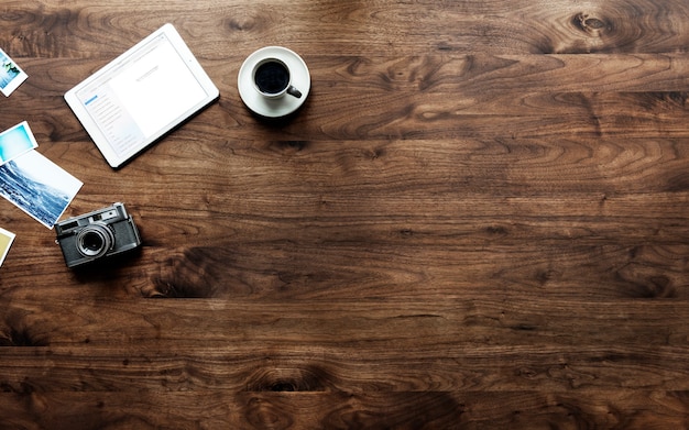 Aerial view of wooden table and photography hobby concept