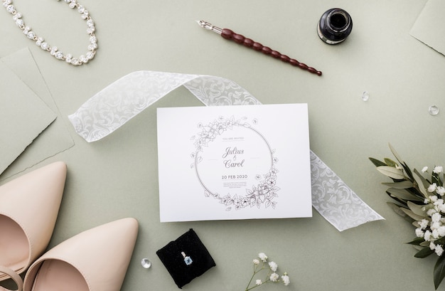 Arrangement of wedding elements with card mock-up