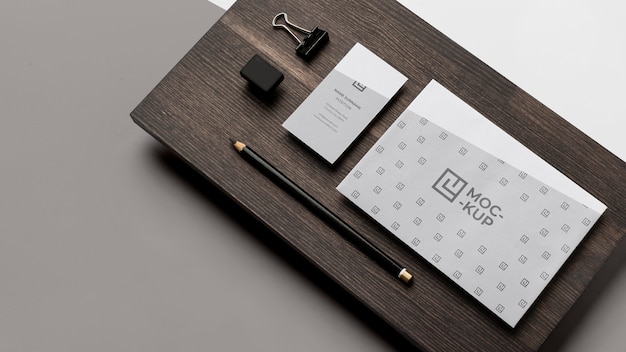 Assortment of mock-up stationery on wood