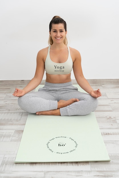 Athletic woman doing yoga at home