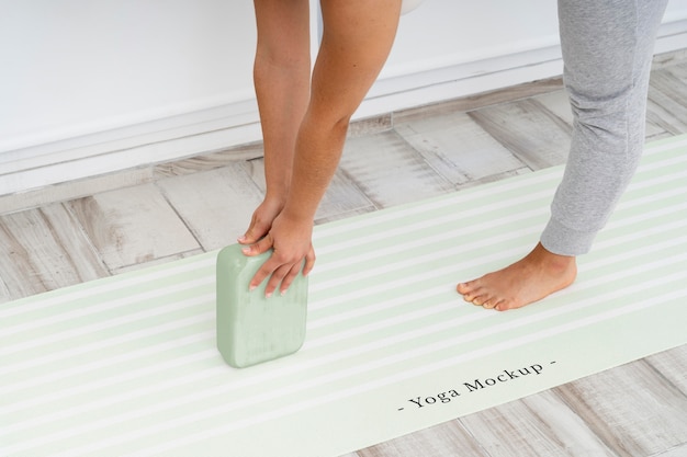 Athletic woman doing yoga at home