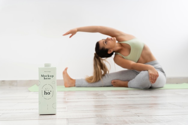 Athletic woman doing yoga at home