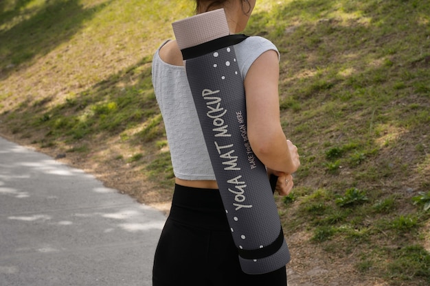 Athletic woman with yoga mat mock-up design