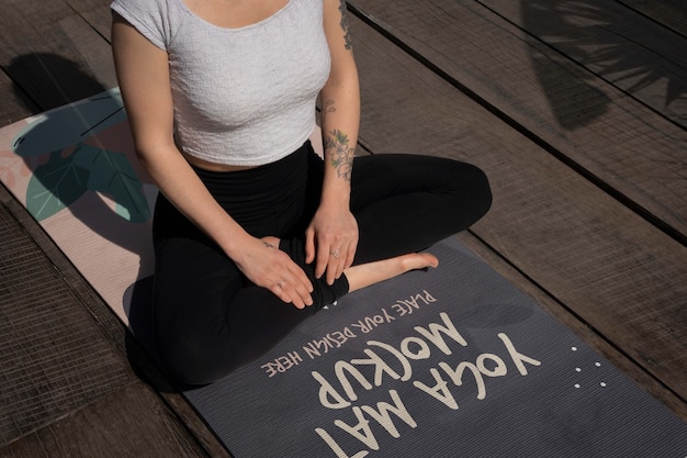 Athletic woman with yoga mat mock-up design