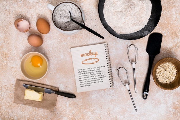 Bakery recipe on notebook with ingredients