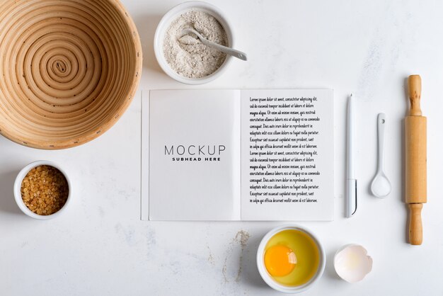 PSD baking ingredients with mockup recipe book