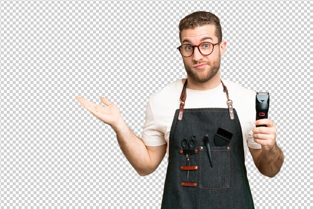 PSD barber man in an apron over isolated chroma key background having doubts while raising hands