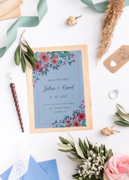 Beautiful composition of wedding elements with invitation mock-up