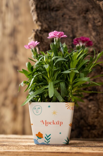 PSD beautiful flower pot indoors mockup