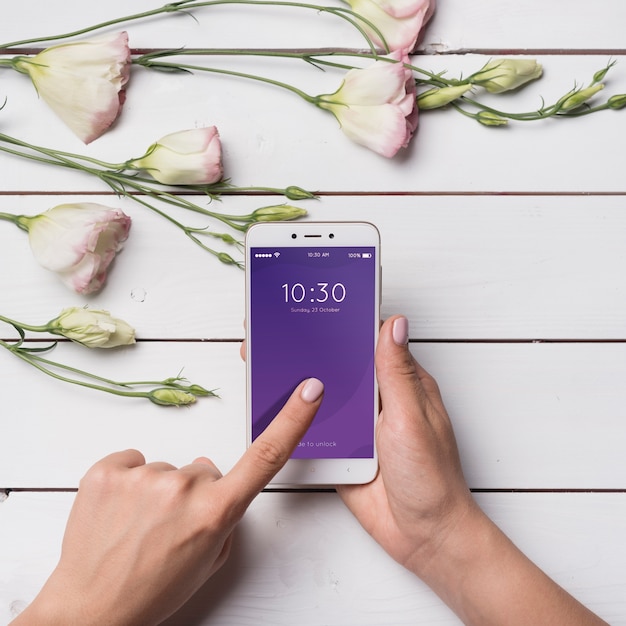 Beautiful smartphone mockup with floral decoration