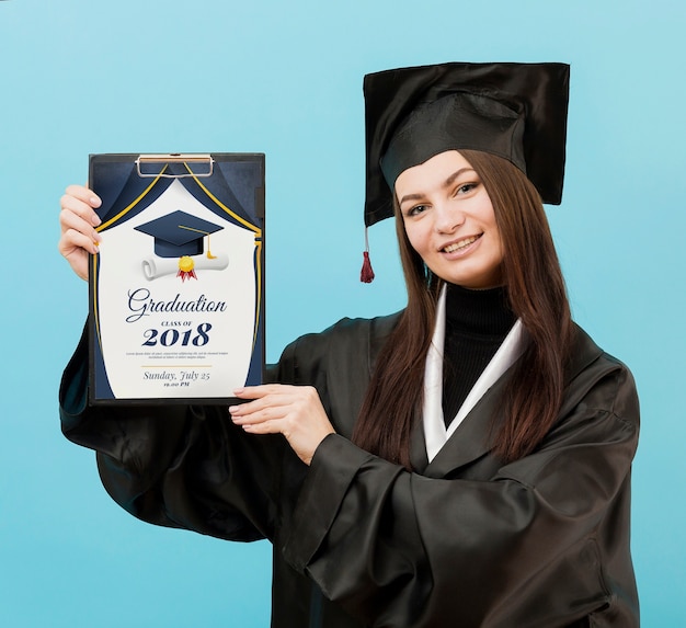 PSD beautiful student holding graduation diploma