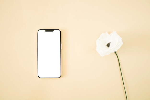 Beige mobile mockup with flower