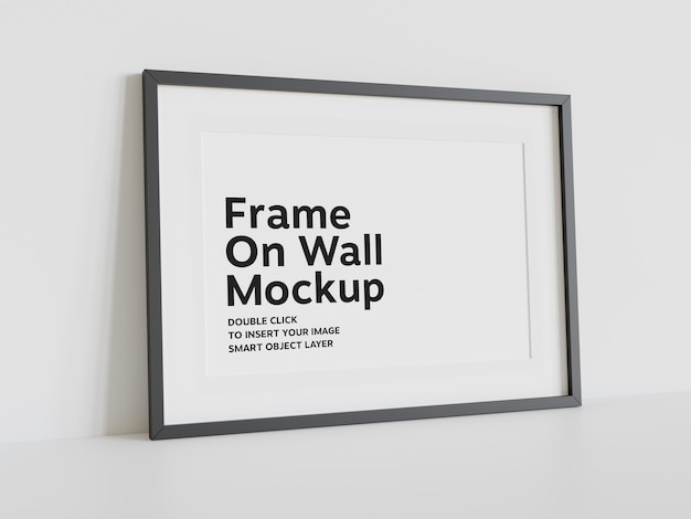 Black frame leaning on wall Mockup