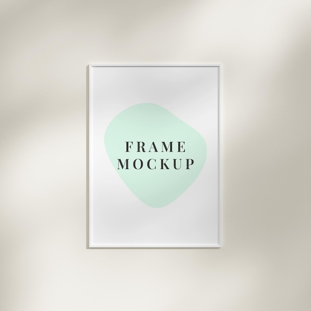 Blank frame on a wall with natural shadow