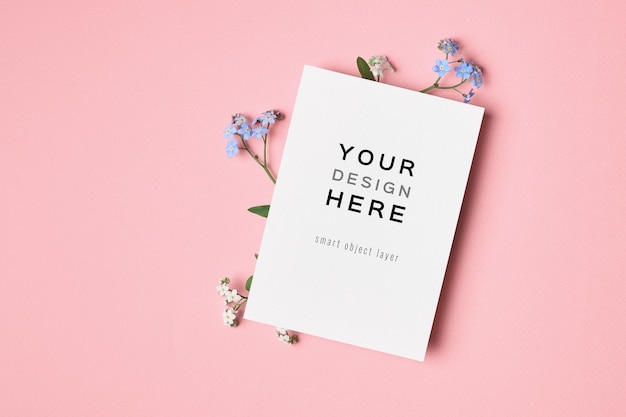 Blank greeting or invitation card mockup on pink