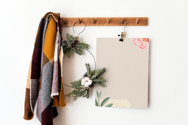 Blank paper hanging by the wall mockup