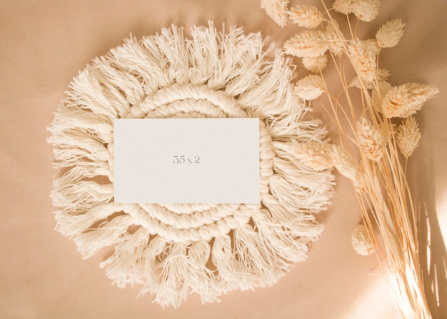 PSD blank paper sheet cards mockup with dry grass