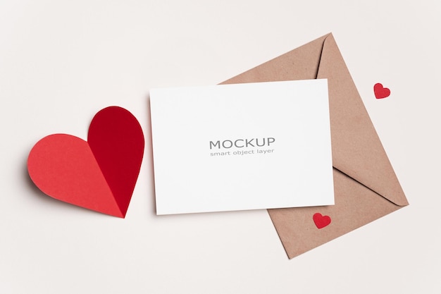 Blank paper Valentines day card mockup with envelope and heart