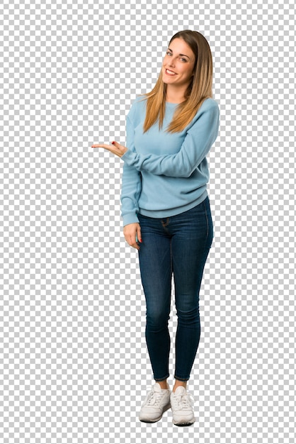 Blonde woman with blue shirt presenting an idea while looking smiling towards