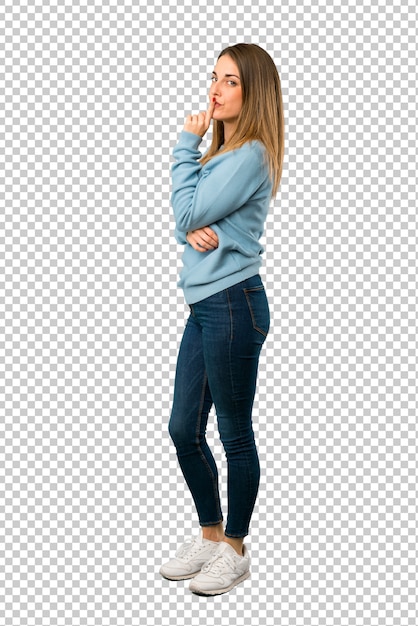 Blonde woman with blue shirt showing a sign of closing mouth and silence gesture